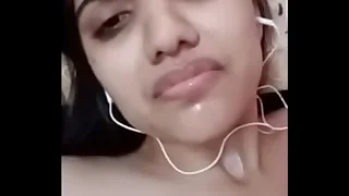 Indian girl with membrane call with her small fry friend